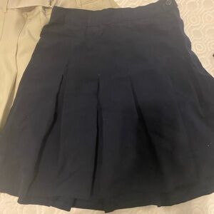 TWO Girls uniform skirts: size 12, one navy, one khaki